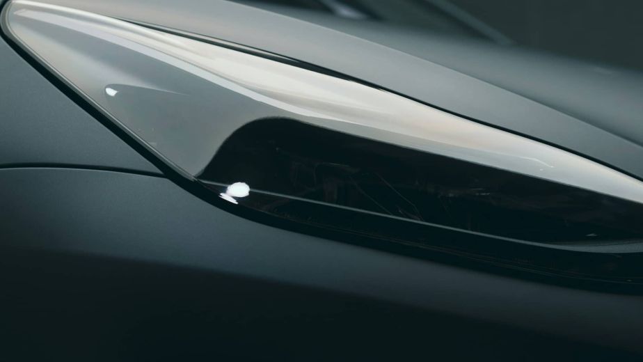 Close-up of a gray car headlight